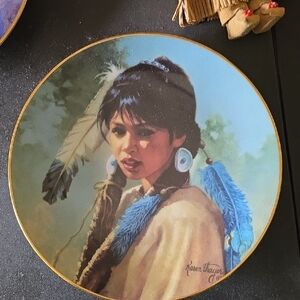 Decorative Ceramic Plate with Blue and Brown Accents